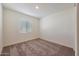 Bright bedroom with carpet flooring and window coverings at 1041 W West Virginia Ave, Florence, AZ 85132