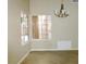 Bright dining room with large windows and chandelier at 10713 E Arrowvale Dr, Sun Lakes, AZ 85248