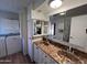 Bright bathroom featuring a double vanity and ample storage at 11411 N 91St Ave # 29, Peoria, AZ 85345