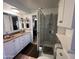 Bathroom with a shower, double vanity, and updated fixtures at 11411 N 91St Ave # 29, Peoria, AZ 85345