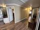Bright hallway with hardwood floors and access to bedrooms at 11411 N 91St Ave # 29, Peoria, AZ 85345