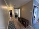 Hallway with hardwood floors and access to bedrooms at 11411 N 91St Ave # 29, Peoria, AZ 85345