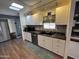 Modern kitchen with white cabinets, granite countertops and stainless steel appliances at 11411 N 91St Ave # 29, Peoria, AZ 85345