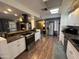Modern kitchen features stainless steel appliances and hardwood floors at 11411 N 91St Ave # 29, Peoria, AZ 85345