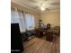 Home office with desk, chair, and ample natural light at 11411 N 91St Ave # 29, Peoria, AZ 85345
