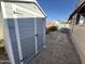 Gray storage shed with double doors and white trim at 11411 N 91St Ave # 29, Peoria, AZ 85345