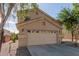 Two-story house with attached garage and landscaping at 12363 W Turney Ave, Avondale, AZ 85392