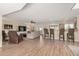 Open living space seamlessly connecting to kitchen and dining areas at 12402 W Cougar Dr, Sun City West, AZ 85375