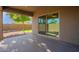 Covered patio with sliding glass door and backyard view at 17763 W Hadley St, Goodyear, AZ 85338