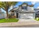 Two-story house with attached garage and landscaped front yard at 18608 N 4Th Ave, Phoenix, AZ 85027