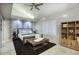 Spacious main bedroom with a king-size bed and large windows at 19198 N 95Th Pl, Scottsdale, AZ 85255