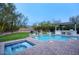 Inviting pool and spa with a spacious patio and outdoor kitchen at 19198 N 95Th Pl, Scottsdale, AZ 85255