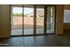 View of backyard through sliding glass doors at 21018 E Calle Luna Ct, Queen Creek, AZ 85142