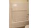 Bathroom with bathtub, shower, and white tile at 21018 E Calle Luna Ct, Queen Creek, AZ 85142
