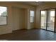 Living room with sliding glass doors leading to the backyard at 21018 E Calle Luna Ct, Queen Creek, AZ 85142