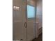 Modern shower with glass enclosure and window at 21018 E Calle Luna Ct, Queen Creek, AZ 85142