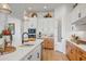 Bright kitchen with white cabinets and a large island, perfect for entertaining at 26032 S 229Th Pl, Queen Creek, AZ 85142