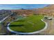 Large community park with sports courts, playground, and open green space at 32521 N 135Th Dr, Peoria, AZ 85383