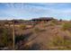 Community pool and clubhouse with a path, offering convenient access and recreation at 32521 N 135Th Dr, Peoria, AZ 85383