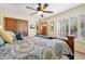 Third bedroom with wooden accents and plantation shutters on the window at 3331 E Fairbrook St, Mesa, AZ 85213