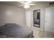 Bedroom with double bed and large mirror at 3418 W Roma Ave, Phoenix, AZ 85017