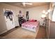 Bedroom with double bed and ample closet space at 3418 W Roma Ave, Phoenix, AZ 85017