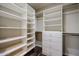 Walk-in closet featuring shelves, drawers and hanging space at 3702 E Brown Rd, Mesa, AZ 85205