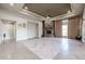 Bright living room with hardwood floors and a stone fireplace at 3702 E Brown Rd, Mesa, AZ 85205