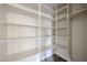 Large walk-in pantry with ample shelving at 3702 E Brown Rd, Mesa, AZ 85205