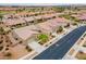 Aerial view of a single-story house in a residential neighborhood at 379 N Marcos Ct, Casa Grande, AZ 85194