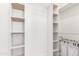 Spacious closet with built-in shelves and hanging rods at 4006 E Rockwood Dr, Phoenix, AZ 85050