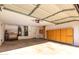 Spacious garage with ample storage cabinets and water heater at 4006 E Rockwood Dr, Phoenix, AZ 85050