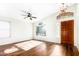 Living room featuring hardwood floors and a wood door at 4006 E Rockwood Dr, Phoenix, AZ 85050