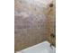 Clean bathroom with tile shower and tub at 4633 N 127Th Dr, Litchfield Park, AZ 85340