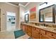 Elegant bathroom with granite double vanity and walk-in shower at 4633 N 127Th Dr, Litchfield Park, AZ 85340
