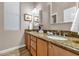 Elegant bathroom with double vanity and granite countertops at 4633 N 127Th Dr, Litchfield Park, AZ 85340