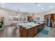 Bright kitchen with large island, granite countertops, and ample cabinet space at 4633 N 127Th Dr, Litchfield Park, AZ 85340