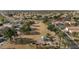 Community park with playground equipment and lush trees at 4633 N 127Th Dr, Litchfield Park, AZ 85340