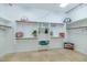Large walk-in closet with custom shelving and ample storage at 4633 N 127Th Dr, Litchfield Park, AZ 85340