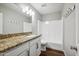 Bathroom with granite countertop and white cabinets at 4808 S 21St St, Phoenix, AZ 85040