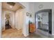 Clean hallway with tile floors and access to rooms at 684 S 231St Dr, Buckeye, AZ 85326