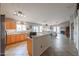 Open concept kitchen with granite counters and breakfast bar at 684 S 231St Dr, Buckeye, AZ 85326