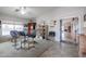 Home office with built-in shelving and plenty of natural light at 684 S 231St Dr, Buckeye, AZ 85326