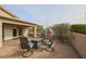 Relaxing patio with fire pit and seating area at 684 S 231St Dr, Buckeye, AZ 85326