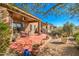 Covered patio with seating area and a view of the desert at 7143 E Canyon Wren Dr, Gold Canyon, AZ 85118