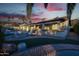 Backyard oasis with fire pit, patio, and lush landscaping at 7514 N 22Nd Pl, Phoenix, AZ 85020