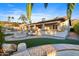 Landscaped backyard with fire pit and patio seating at 7514 N 22Nd Pl, Phoenix, AZ 85020