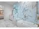 Spa-like bathroom with marble shower and bathtub at 7514 N 22Nd Pl, Phoenix, AZ 85020