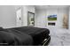 Primary bedroom with a king-size bed and fireplace at 7514 N 22Nd Pl, Phoenix, AZ 85020