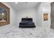 Elegant bedroom with a plush velvet bed and marble floors at 7514 N 22Nd Pl, Phoenix, AZ 85020